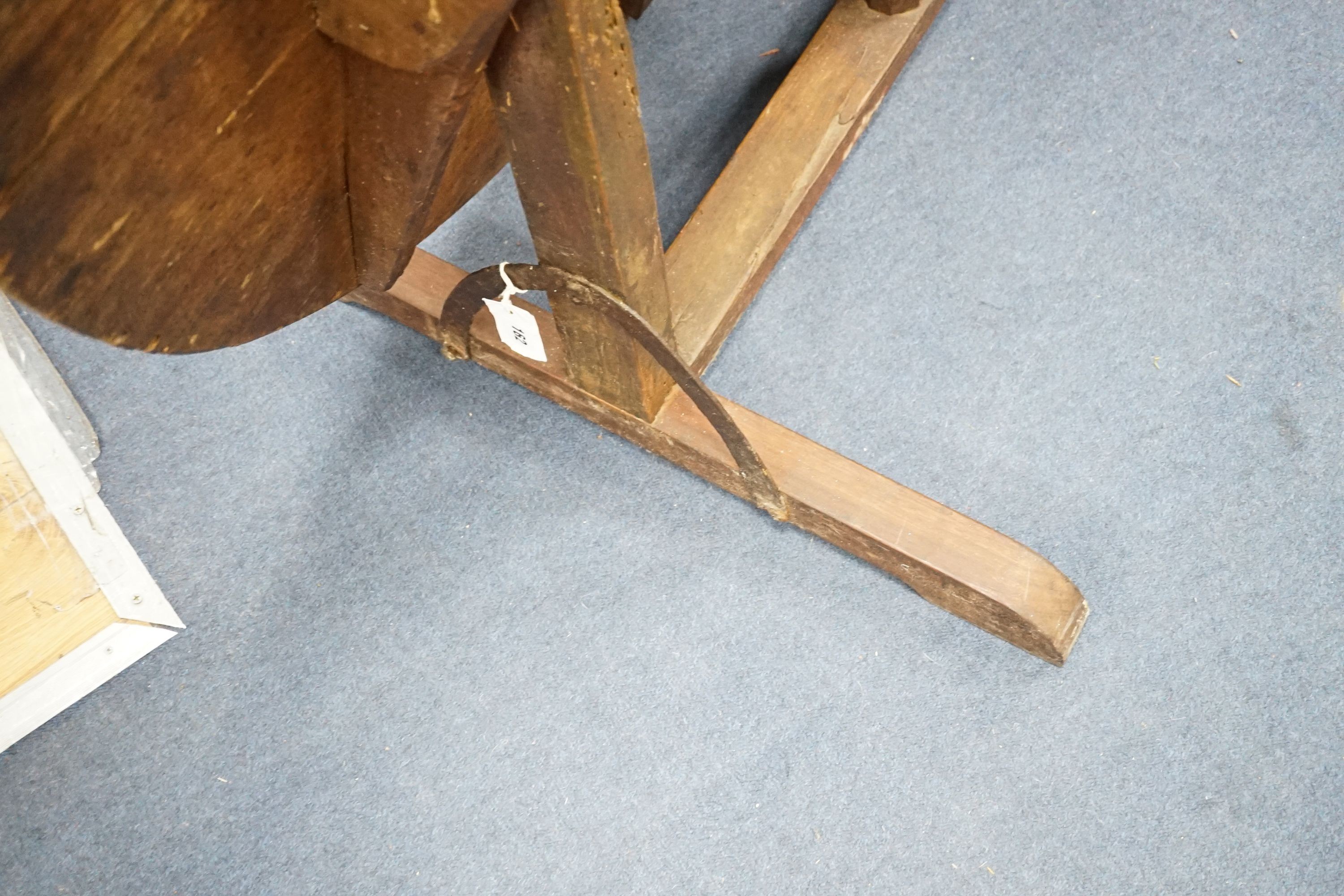 A 19th century Midlands area yew and elm Windsor child's elbow chair with crinoline stretcher, width 37cm, depth 44cm, height 65cm